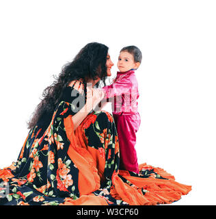 mother and little son in the Gypsy costumes.isolated on white background Stock Photo