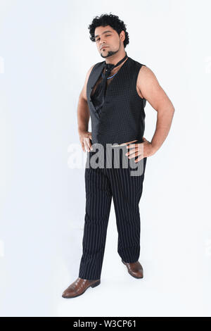 stylish man dancer posing for the camera .isolated on a white background. Stock Photo