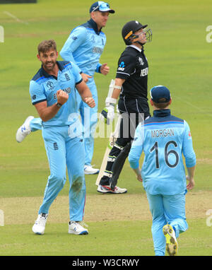 London, UK. 14th July, 2019. Liam Plunkett of England celebrates taking the wicket of James Neesham of New Zealand during the New Zealand v England, ICC Cricket World Cup Final match, at Lords, London, England. Credit: ESPA/Alamy Live News Stock Photo