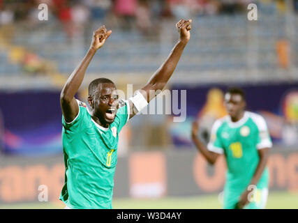 Cairo. 14th July, 2019. Senegal's Cheikhou Kouyate celebrates team's score during the semifinal match between Senegal and Tunisia at the 2019 Africa Cup of Nations in Cairo, Egypt on July 14, 2019. Senegal won 1-0 and advanced to the final. Credit: Ahmed Gomaa/Xinhua/Alamy Live News Stock Photo