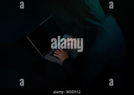 Hackers with computer data theft in the social world. Stock Photo