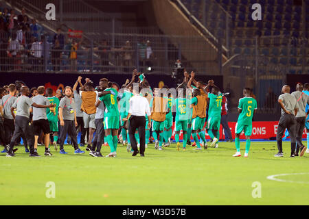 Cairo, Egypt. 14th July, 2019. Senegalese players celebrating victory and qualification to the final of the African Cup at the end of the match Tunisia vs Senegal semi-final at the June 30 stadium in Cairo.Total Africa Cup of Nations Egypt 2019 .photo: Chokri Mahjoub Credit: Chokri Mahjoub/ZUMA Wire/Alamy Live News Stock Photo