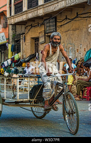 Traditional Rickshaw Drivers in Kumartuli,Kolkata,India Stock Photo