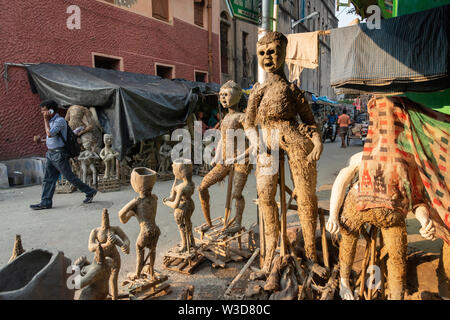 Clay Statues getting ready in the streets of  Kumartuli,Kolkata,India Stock Photo