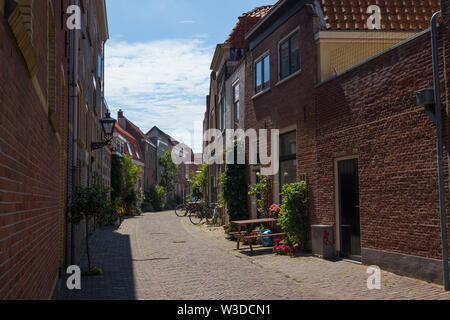 Leiden, Holland - July 05, 2019: Vestestraat, small alley in the historical centre of Leiden city Stock Photo