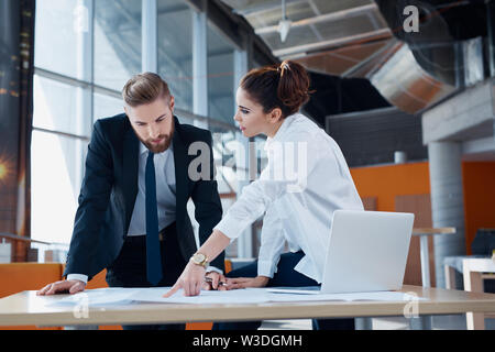 Business partners working on new project at modern office Stock Photo