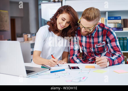 Web designers creating prototype of new website layout Stock Photo