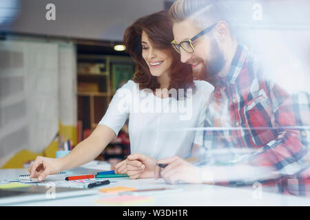 Creative designers working at office. Creating new web desing Stock Photo