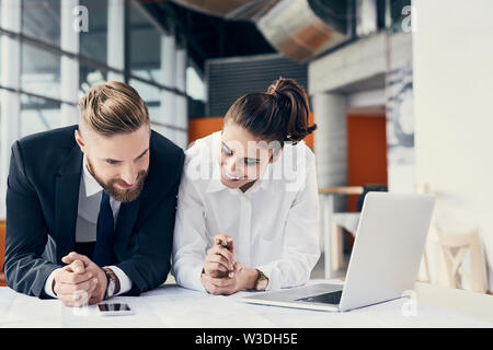 Two architects working together at modern office Stock Photo