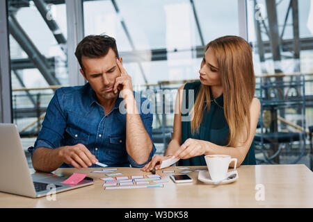 Two webdesigners working on new web site project Stock Photo