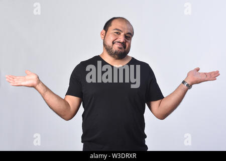 man with doubt or confused expression on white background Stock Photo