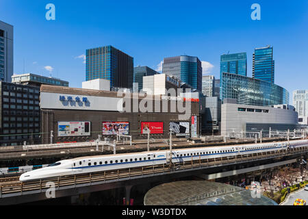 Japan, Honshu, Tokyo, Yurakucho, Skyline and Shinkansen Bullet Train Stock Photo