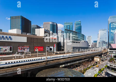 Japan, Honshu, Tokyo, Yurakucho, Skyline and Shinkansen Bullet Train Stock Photo