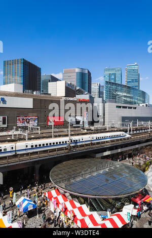 Japan, Honshu, Tokyo, Yurakucho, Skyline and Shinkansen Bullet Train Stock Photo