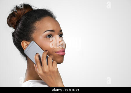 African American Woman with a mobile phone Stock Photo