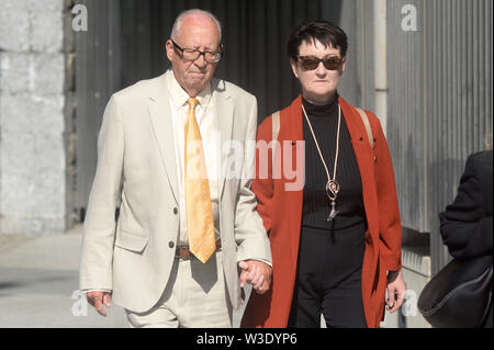 Patric and Geraldine Kriegel, the parents of murdered Ana Kriegel, arrive at the Criminal Courts of Justice in Dublin. Two juvenile killers are due to be sentenced today after they were convicted of the murder of 14-year-old Kriegel on June 18. Stock Photo