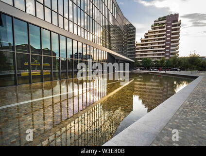MILAN, Italy: 14 July 2019: Modern architecture in the new square Adriano Olivetti in the south of town, inaugurated  on september  27th by the major Stock Photo