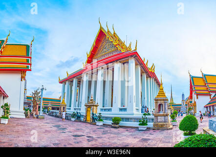 BANGKOK, THAILAND - APRIL 22, 2019: The panoramic  view on the facade part of Phra Ubosot shrine, the main temple in Wat Pho complex, also called the Stock Photo