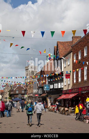 Shoppers in the High Street in Salisbury, Wiltshire. Stock Photo