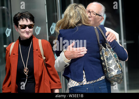 Patric and Geraldine Kriegel, the parents of murdered Ana Kriegel, leaving the Criminal Courts of Justice in Dublin. Two juvenile killers are due to be sentenced today after they were convicted of the murder of 14-year-old Kriegel on June 18. Stock Photo
