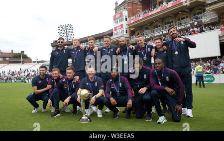 England team group (left to right) Top Row: James Vince, Ben Stokes, Joe Root, Joes Butler, Moeen Ali, Tom Curran, Liam Dawson and Liam Plunkett. Bottom Row: Mark Wood, Jonny Bairstow, Jason Roy, Eoin Morgan, Adil Rashid, Chris Woakes and Jofra Archer during the World Cup celebrations at the Kia Oval, London. Stock Photo