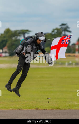 Richard Browning the former Royal Marines Reservist and founder of Gravity Industries demonstrates his jet powered flying suit at Yeovilton Air Day. Stock Photo