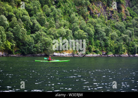 Adventure with kayak at Geirangerfjord , stunning natural masterpiece included in UNESCO World Heritage , Sunnmore region, Norway Stock Photo