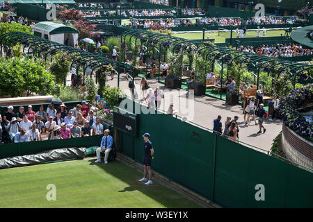 crowds of spectators at 2019 Wimbledon Stock Photo