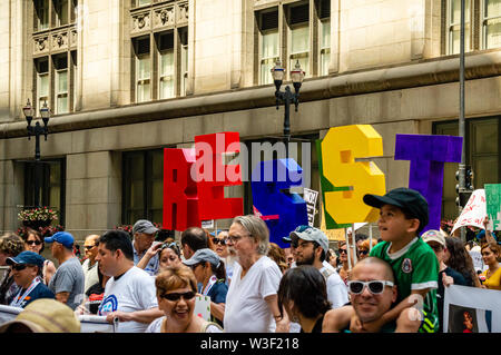 Downtown, Chicago-July 13, 2019: Protest against Immigration ICE and Border Patrol. Colorful RESIST. Stock Photo