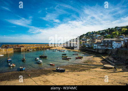 Small fishing boats in Mousehole harbour Cornwall England GB UK EU Europe Stock Photo