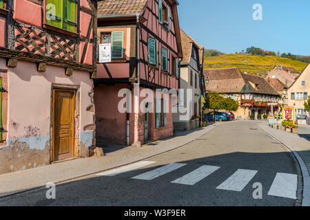 street in Andlau with view to vineyards above, Alsace, France Stock Photo