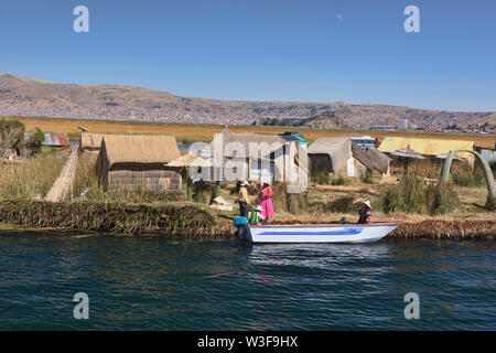 Totora reed boats by the Uros indigenous floating islands with reed ...