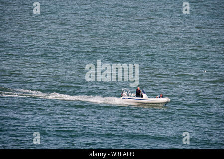 Boats racing offshore at Skerries Stock Photo