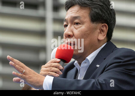 Tokyo, Japan. 15th July, 2019. Yukio Edano leader of the Constitutional Democratic Party of Japan (CDP) delivers a street speech outside Shinjuku Station. Edano showed support for the party fellow candidates for the July 21 House of Councillors election. Credit: Rodrigo Reyes Marin/AFLO/Alamy Live News Stock Photo