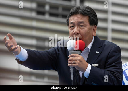 Tokyo, Japan. 15th July, 2019. Yukio Edano leader of the Constitutional Democratic Party of Japan (CDP) delivers a street speech outside Shinjuku Station. Edano showed support for the party fellow candidates for the July 21 House of Councillors election. Credit: Rodrigo Reyes Marin/AFLO/Alamy Live News Stock Photo