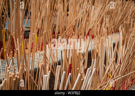 Incense sticks in buddhist temple in Bangkok Thailand, worship Stock Photo