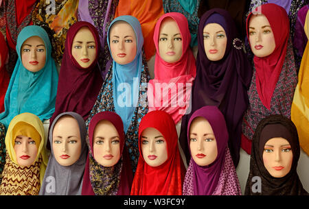 kuala lumpur, malaysia - december 25, 2014: display of headscarves at an old town  shop selling traditional islamic women clothes Stock Photo