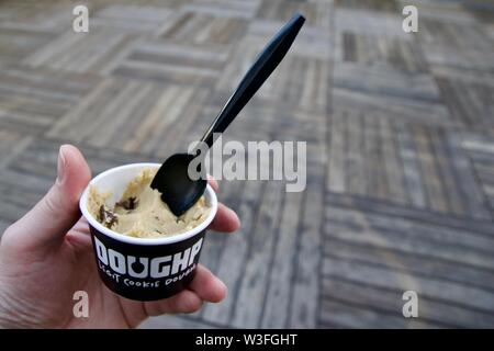 SAN FRANCISCO, CALIFORNIA, UNITED STATES - NOV 25th, 2018: Safe-to-eat raw monster cookie dough with chocolate chips in small portion bowl Stock Photo