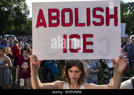 July 12, 2019 - Washington, District of Columbia, United States of America - A demonstrator holds an ''Abolish ICE'' protest sign during a vigil protesting treatment of migrant children by U.S. Immigration and Customs Enforcement (ICE) held near the White House in Lafayette Park in Washington, D.C. on July 12, 2019. (Credit Image: © Alex Edelman/ZUMA Wire)