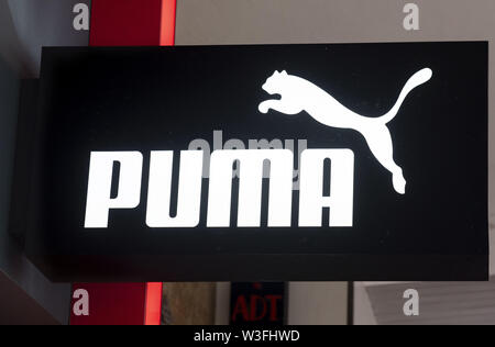 German multinational sportswear brand Puma store and logo in Hong Kong  Stock Photo - Alamy