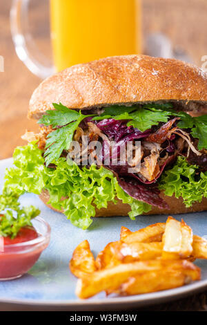 pulled pork in a bun with beer Stock Photo