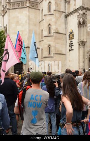 Extinction Rebellion stage a protest outdid the Royal Courts of Justice in central London 15th July 2019. Stock Photo