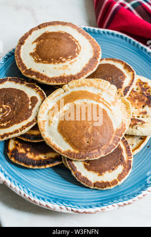 Stack of Plain Pancakes in Plate for Breakfast. Stock Photo