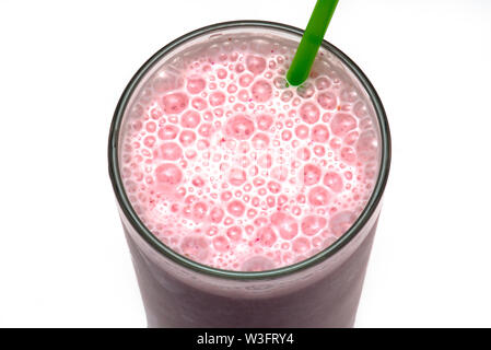 Top view of Glass with Strawberry Milkshake isolated on white Background Stock Photo