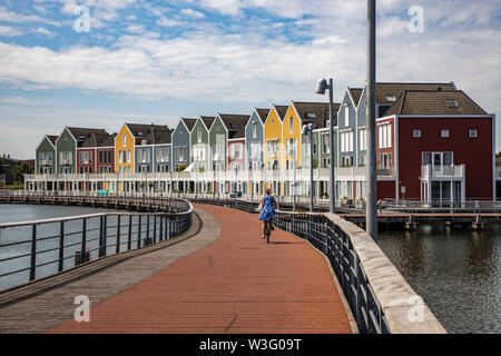 Small town Houten near Utrecht, The Netherlands, bicycles have priority in the 50,000 inhabitants city, generous cycle paths, many leisure areas, wate Stock Photo