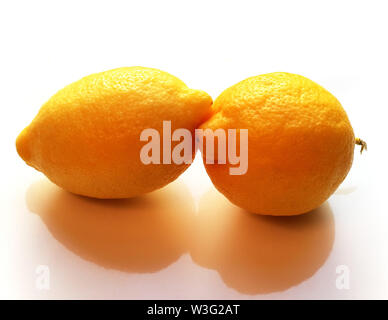 Two yellow lemons isolated on white background Stock Photo
