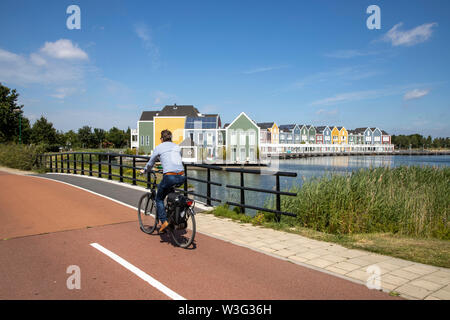 Small town Houten near Utrecht, The Netherlands, bicycles have priority in the 50,000 inhabitants city, generous cycle paths, many leisure areas, wate Stock Photo