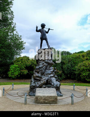 Bronze statue of Peter Pan by sculptor Peter Frampton outside the Palm House at Sefton Park, Liverpool (UK). Only 7 sculptures were cast from the orig Stock Photo