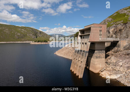 The intake tower at the Monar Dam at in Glen Strathfarrar, Highland Scotland.  The first double curvature arch dam built in Britain in 1963. Stock Photo