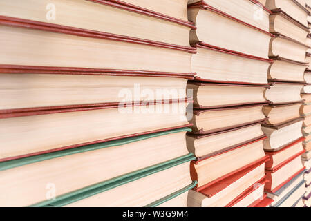 Books pile diminishing perspective view. Texture and background Stock Photo